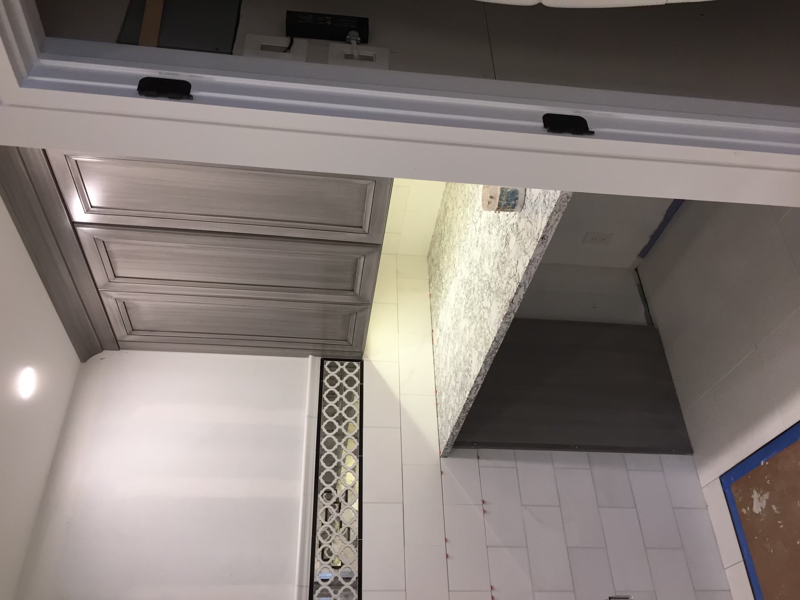 Ceiling cabinets and countertop while the bath is under construction